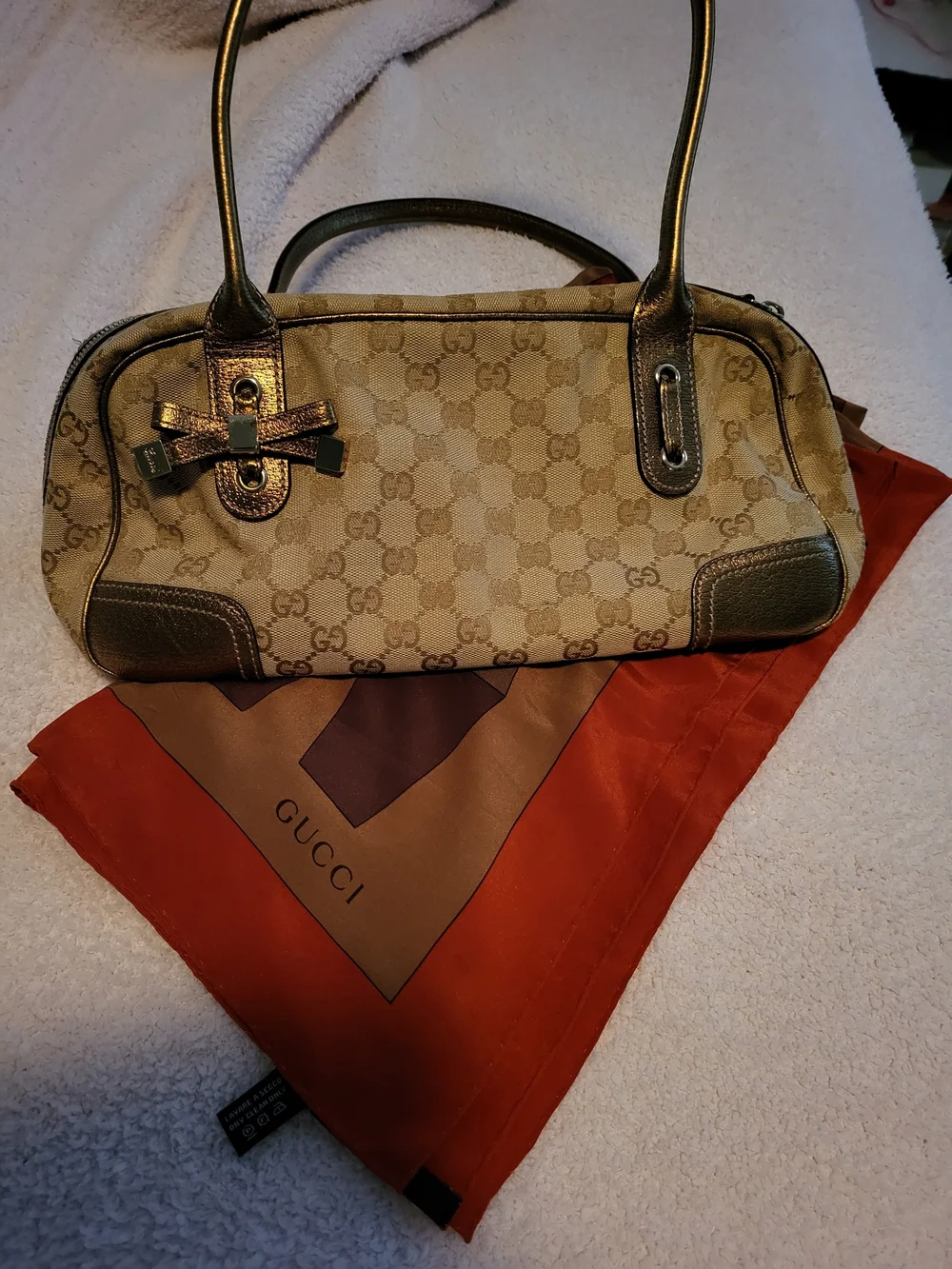 Gucci Beige Monogram Shoulder Bag with Metallic Brown Trim and Bow